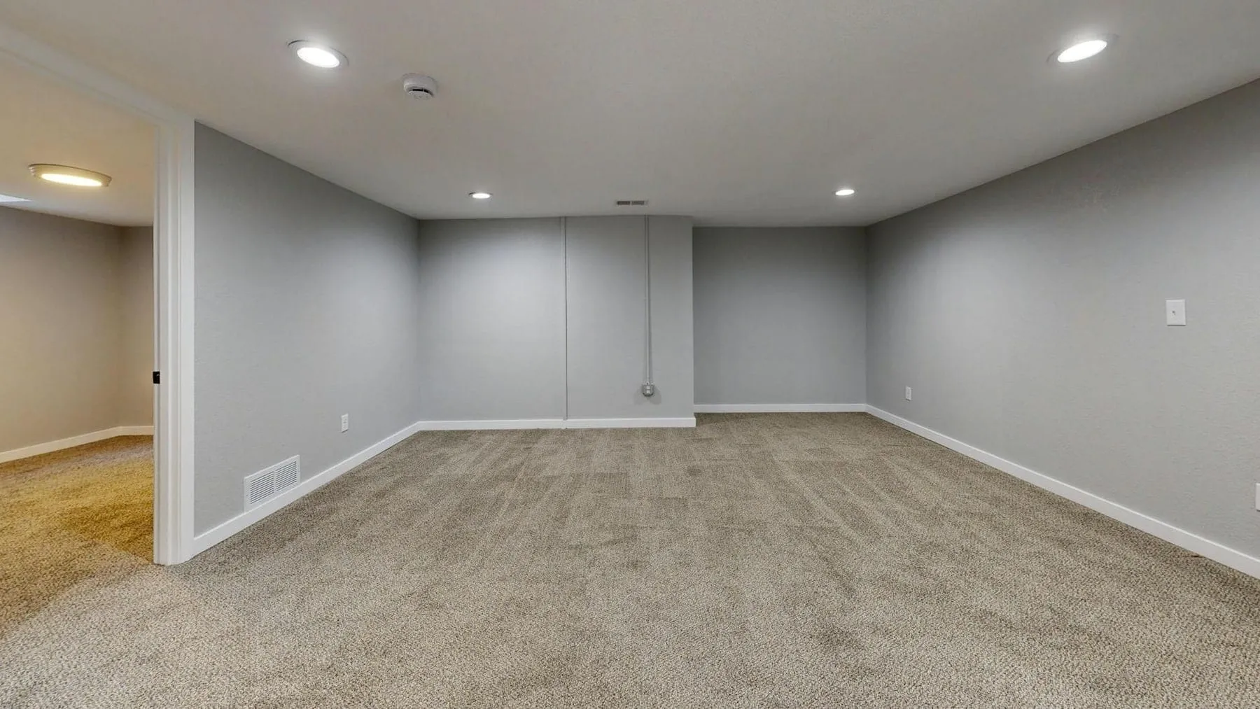Finished basement family room with home theater built by LM Pro Remodeling Group in northern New Jersey